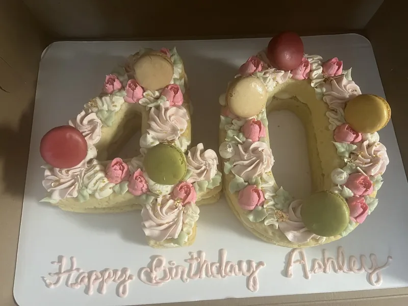 Number forty cake decorated with macarons